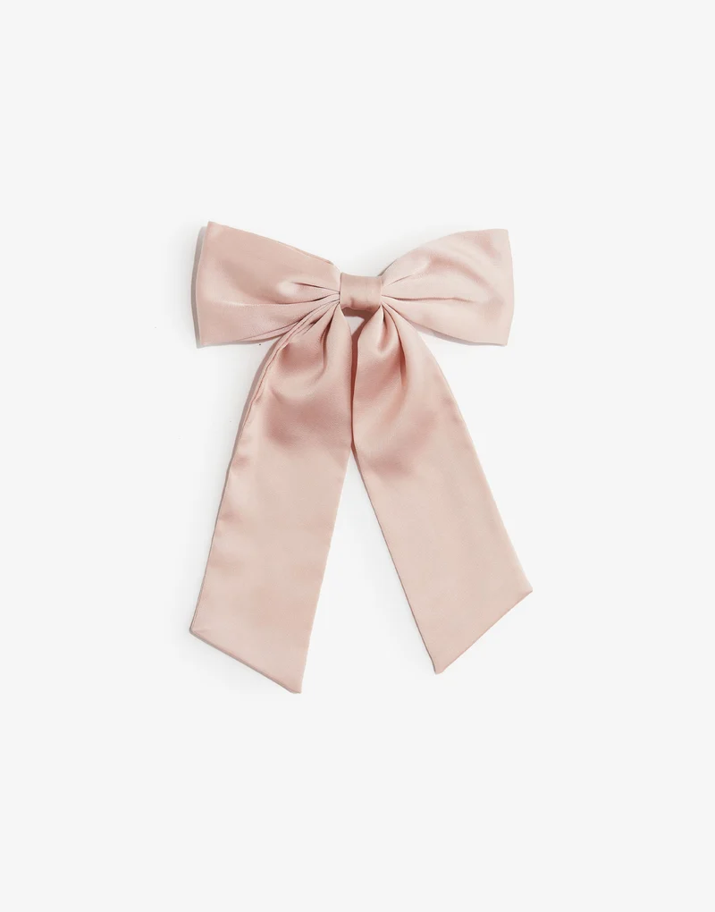 Bow decorated hair clip